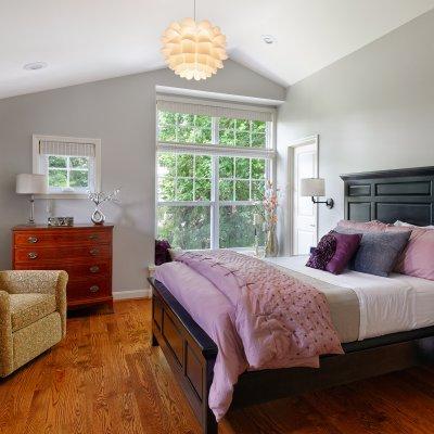 bedroom addition large windows sloped roof Wilcox Architecture